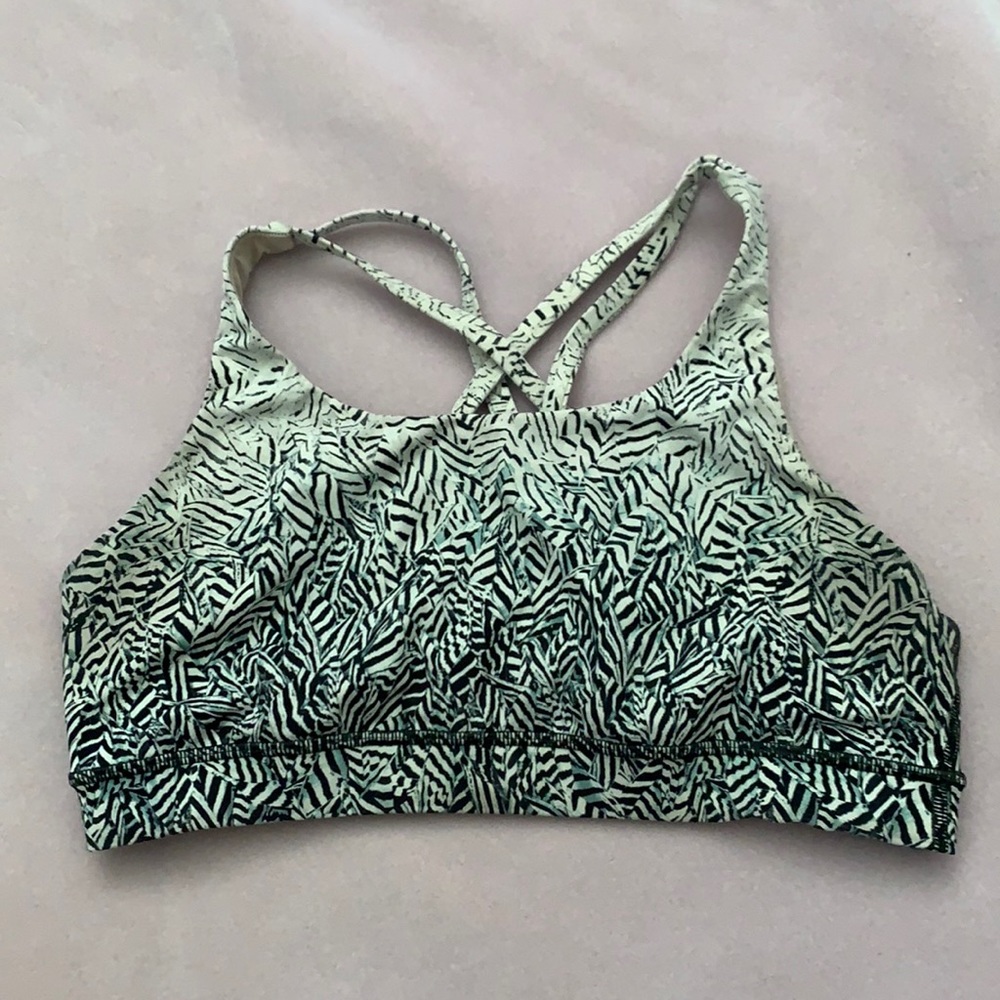 Lululemon black, teal, and off white shorts bra